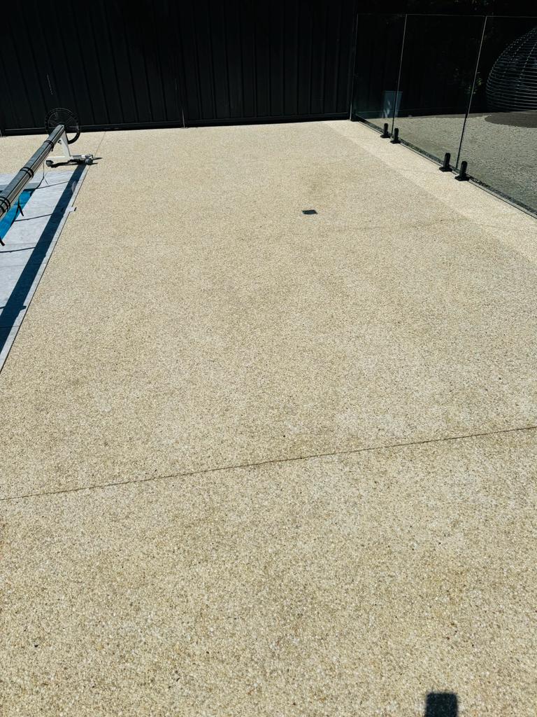 Pool area pressure cleaning in doreen